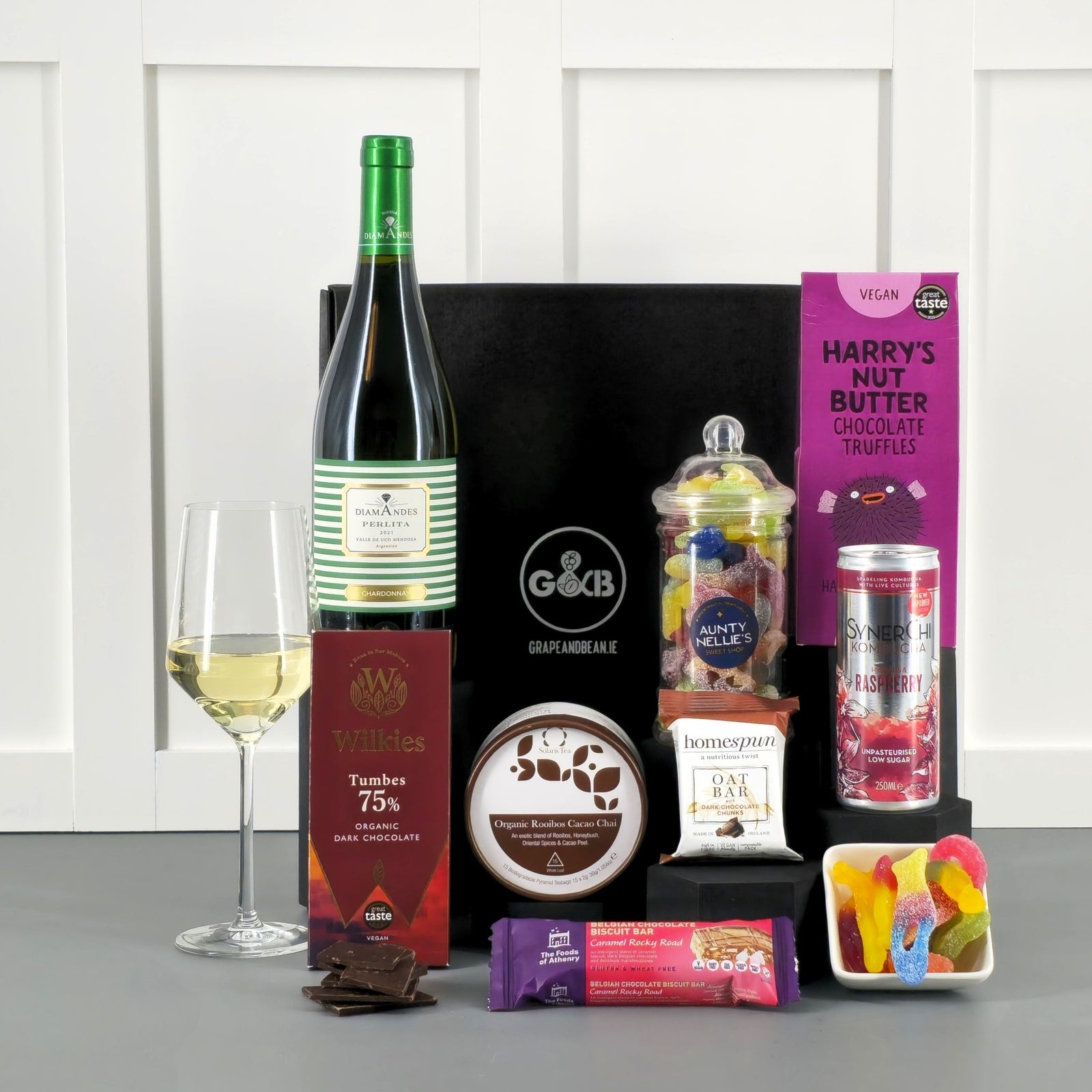 Artisan Irish Food Hamper with Argentinian chardonnay, chocolate, jellies, tea bags, truffles in a black gift box-Vegan Friendly