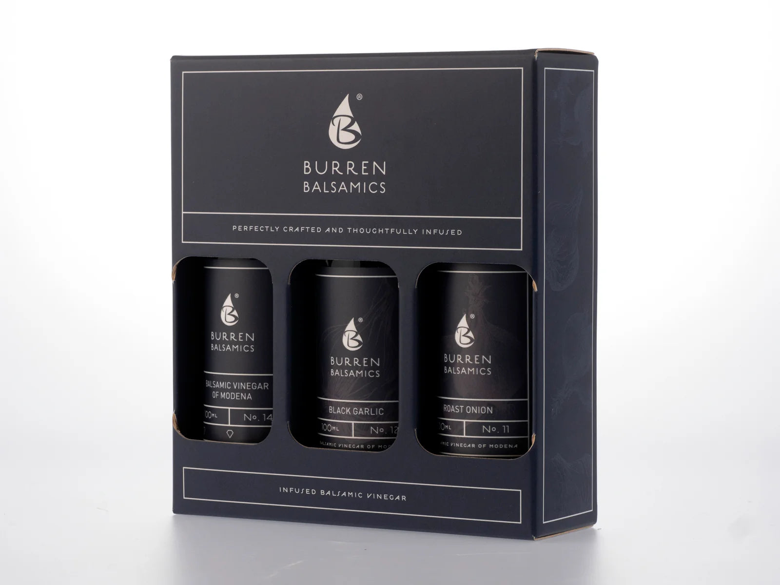 Burren Balsamics packaging with three bottles inside Roast Onion Black Garlic Balsamic Vinegar  on a white background