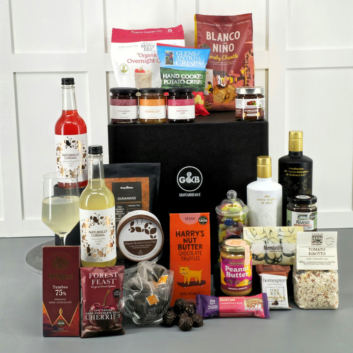 Deluxe Vegan hamper with chocolate, crisps, balsamic, olive oil, oats, coffee, tea, risotto, peanut butter, jams, marmalade, jellies, quince paste