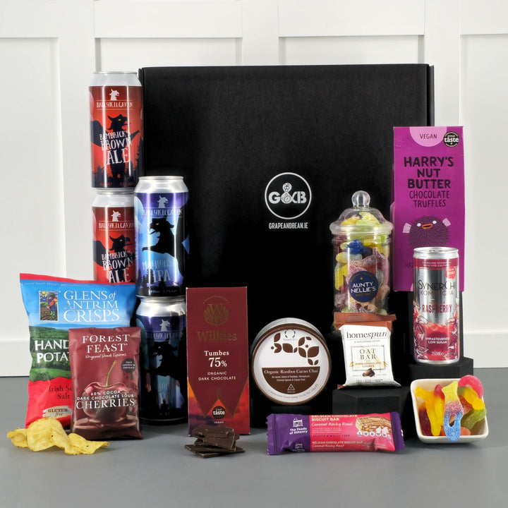 vegan friendly hamper with beer, chocolate, crisps, tea, jellies, truffles and kombucha.