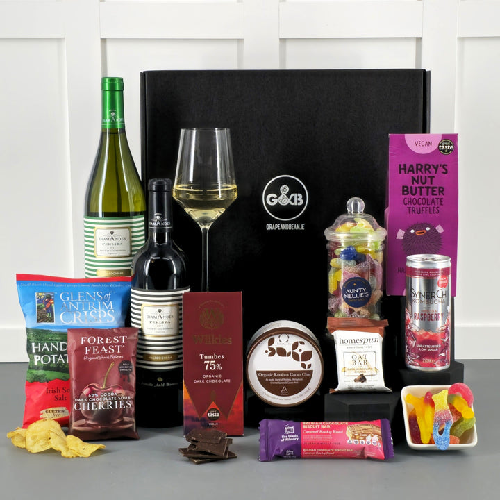 Vegan Friendly hamper with red and white wine, jellies, chocolate, crisps, tea, jellies, truffles and kombucha