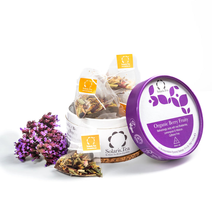 Solaris Tea packaging with tea bags and a purple flower on a white background
