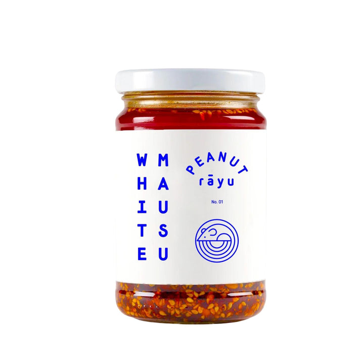 Jar of peanut räyu with visible brand name on a white background