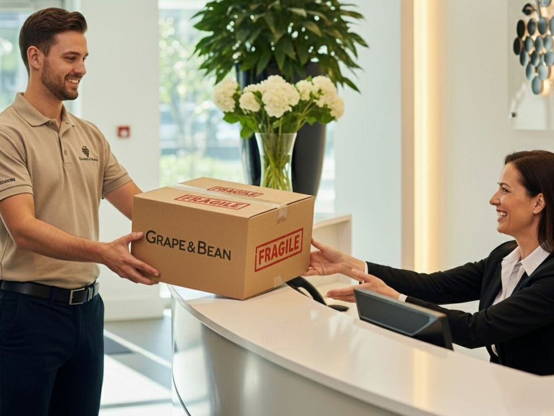 Man delivering a box labeled &