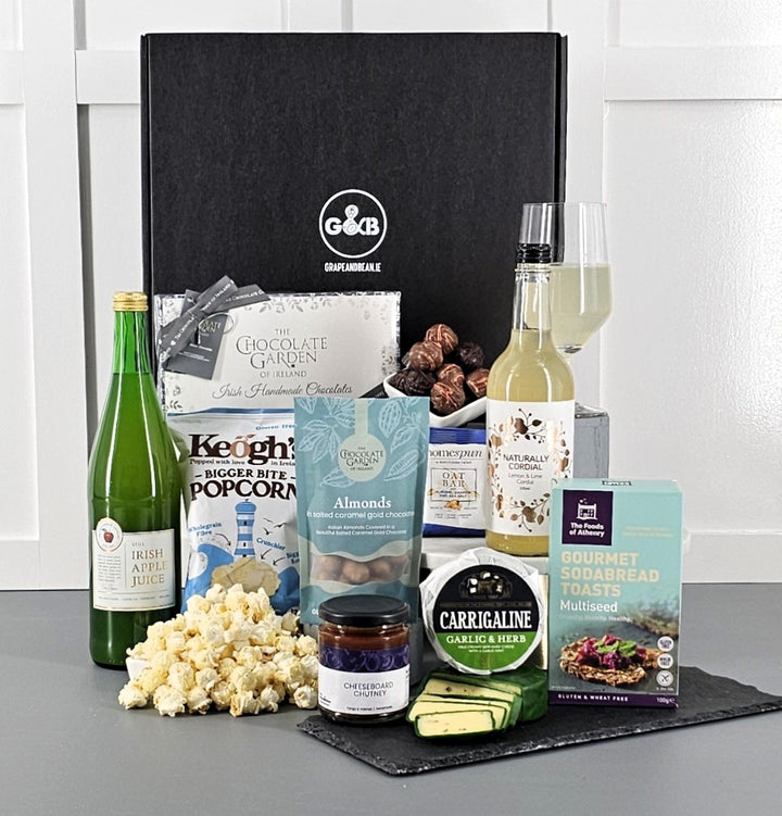 Luxury Gluten Free Irish Hamper with cordial, apple juice, popcorn, chocolate, cheese, chutney, sodabread toasts.